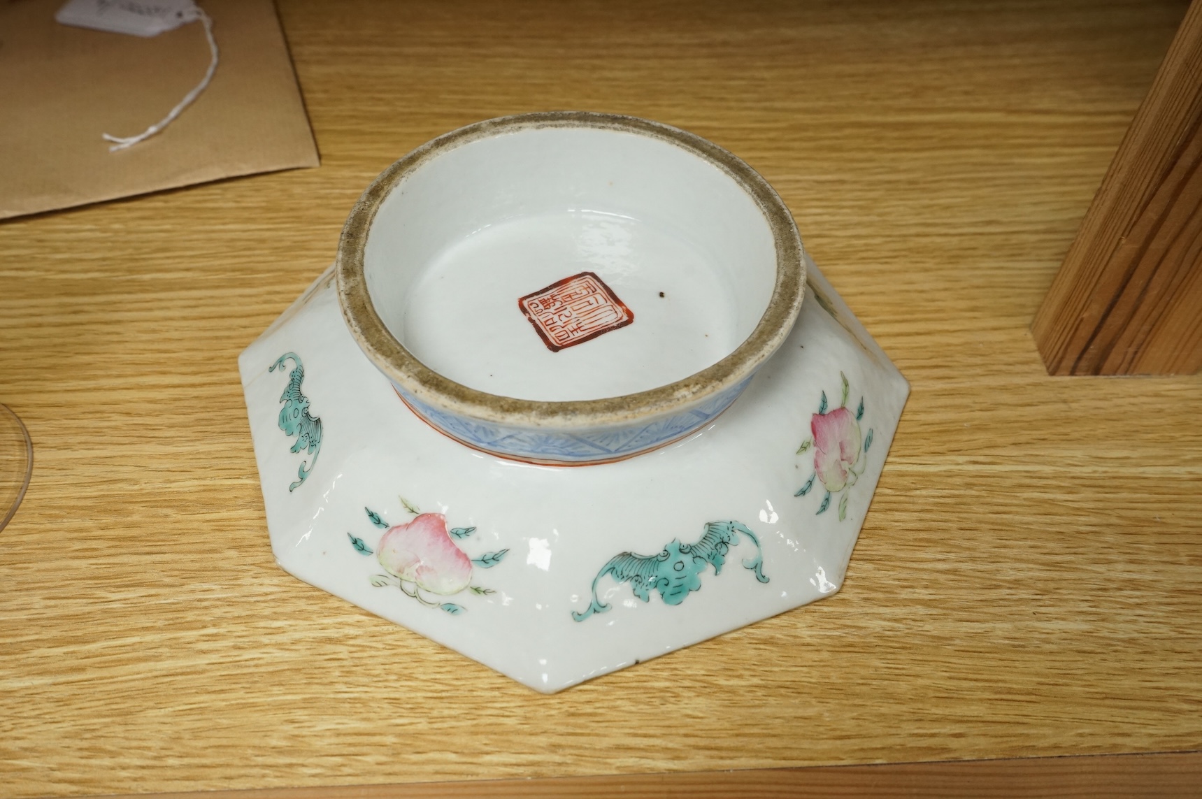 A Chinese ‘Yin-Yang and eight trigrams’ octagonal footed dish, Tongzhi (1862-74) mark and of the period, 18cm wide with accompanying notes on the dish